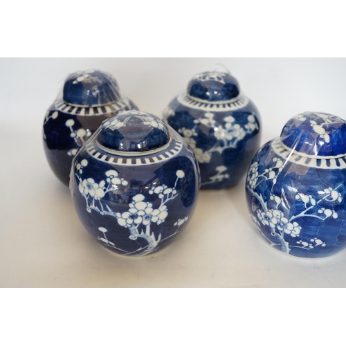 411 - Five Chinese blue and white prunus jars and covers