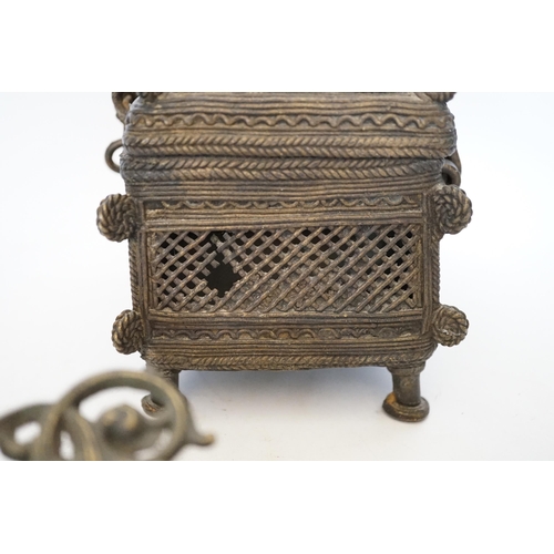 412 - An African Benin style bronze casket and pair of wall sconces, 22cm