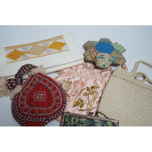 421 - A collection of 20th century embroidered bags, a patchwork pin cushion, a beadwork mat, etc.