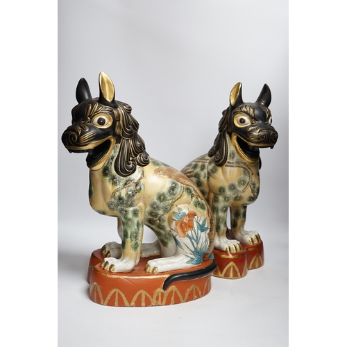 430 - A pair of Chinese Macau porcelain lion dogs, 43cm