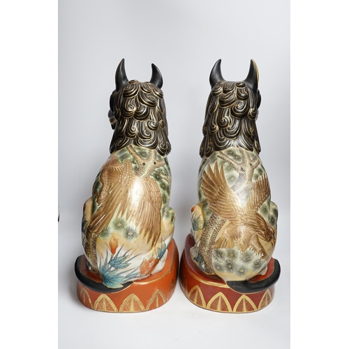 430 - A pair of Chinese Macau porcelain lion dogs, 43cm