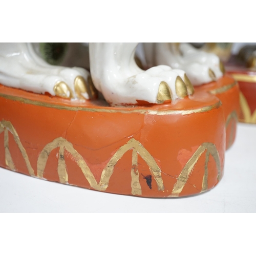 430 - A pair of Chinese Macau porcelain lion dogs, 43cm