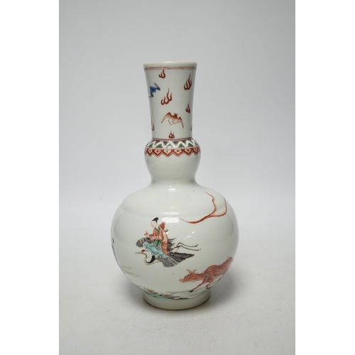 446 - A Chinese famille verte bottle vase, Kangxi mark but later, 22cm