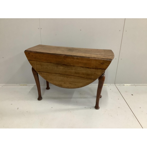 45 - An 18th century provincial oak drop leaf pad foot table, width 104cm, depth 38cm, height 71cm