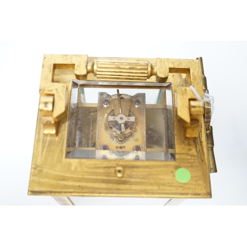 452 - ** ** A late 19th century French gilt brass cased eight day repeating carriage clock with key, 17cm ... 