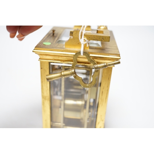 452 - ** ** A late 19th century French gilt brass cased eight day repeating carriage clock with key, 17cm ... 