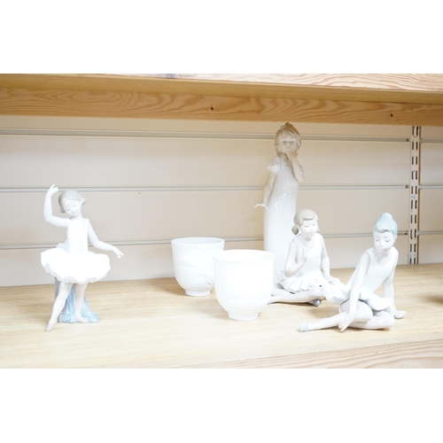 459 - Twelve Lladro figures including a dog and three ducks, a plaque and two cups together ith three Nao ... 
