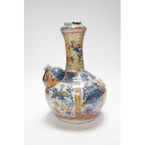 463 - A 17th/18th Chinese clobbered Kendi, 24cm