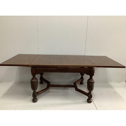 47 - A Jacobean Revival parquetry inlaid rectangular oak draw leaf dining table, 220cm extended, depth 94... 