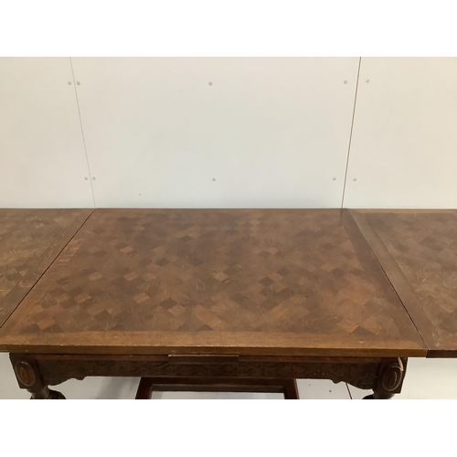 47 - A Jacobean Revival parquetry inlaid rectangular oak draw leaf dining table, 220cm extended, depth 94... 