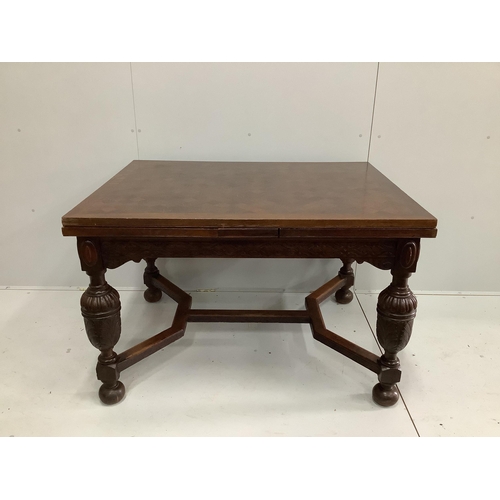 47 - A Jacobean Revival parquetry inlaid rectangular oak draw leaf dining table, 220cm extended, depth 94... 