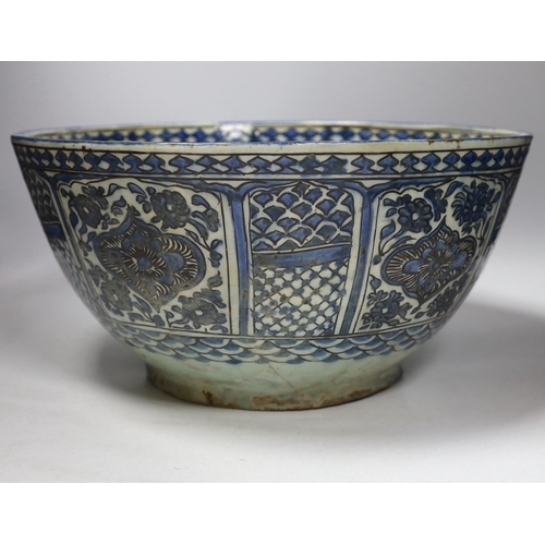 471 - A large Persian underglaze blue and black fritware bowl, Safavid, 17th/18th century 40cm diameter, 2... 