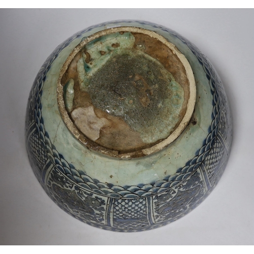 471 - A large Persian underglaze blue and black fritware bowl, Safavid, 17th/18th century 40cm diameter, 2... 