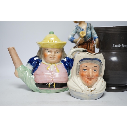 475 - A Capodimonte figure, a Staffs pottery teapot, a jug and a Beswick pig