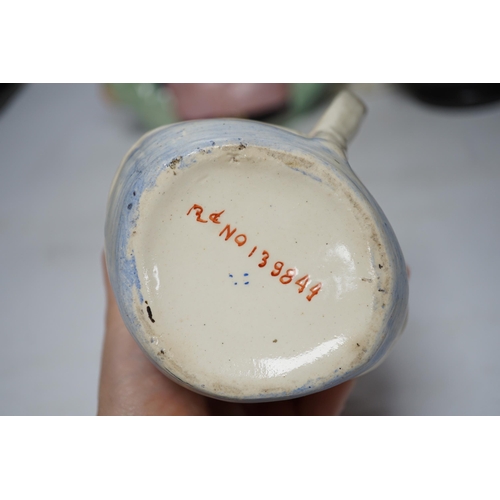 475 - A Capodimonte figure, a Staffs pottery teapot, a jug and a Beswick pig