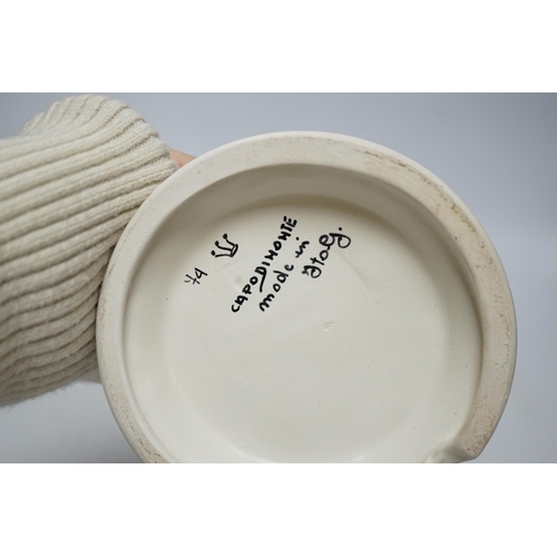 475 - A Capodimonte figure, a Staffs pottery teapot, a jug and a Beswick pig