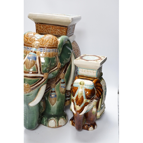 476 - A pair and another elephant and howdah garden seats, largest 43cm