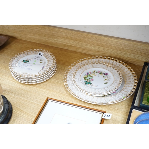 483 - * * A set of nine French porcelain dessert dishes, painted with roses, and a larger, matching cake d... 