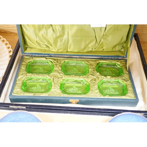 484 - A cased Worcester powder blue and silvered coffee set with enamelled silver spoons together with a c... 