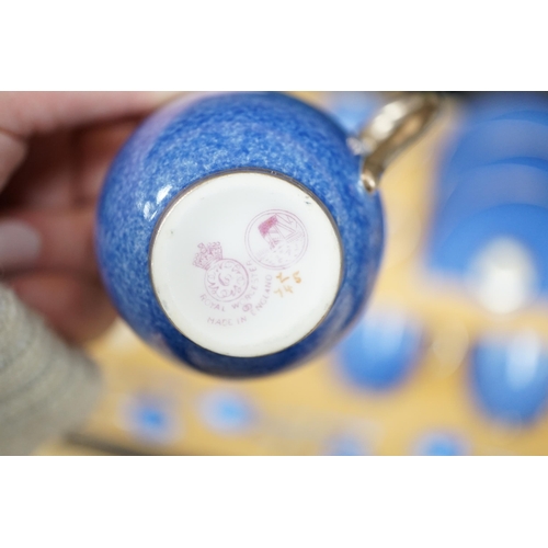 484 - A cased Worcester powder blue and silvered coffee set with enamelled silver spoons together with a c... 