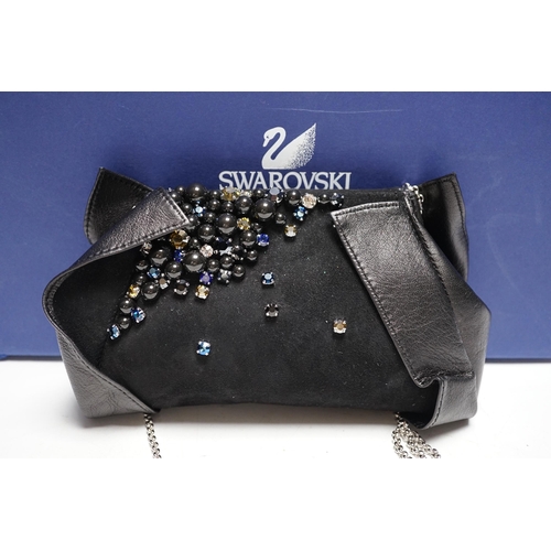 498 - A Swarovski diamanté decorated black suede and leather evening bag, with chain handle, dust bag, box... 