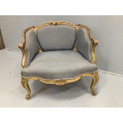 50 - A Victorian carved giltwood and composition upholstered salon chair, width 70cm, depth 60cm, height ... 