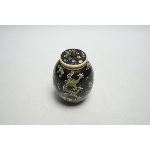 500 - A Chinese Kangxi clobbered dragon jar and cover, 10cm high