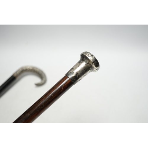 514 - Two early 20th century silver topped walking canes, longest 92cm