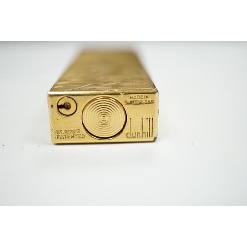 542 - A cased gilt Dunhill lighter