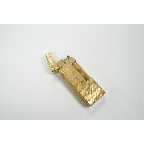542 - A cased gilt Dunhill lighter