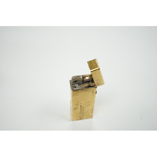 542 - A cased gilt Dunhill lighter