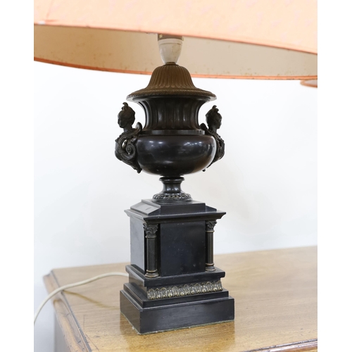 552 - A pair of bronze and polished slate urns, converted to desk lamps (likely ex clock garniture), 34cm ... 