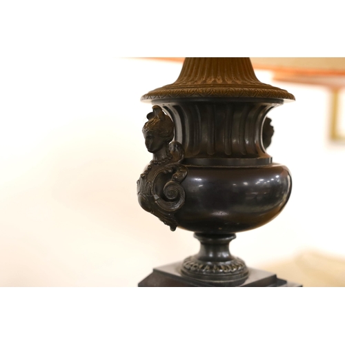 552 - A pair of bronze and polished slate urns, converted to desk lamps (likely ex clock garniture), 34cm ... 