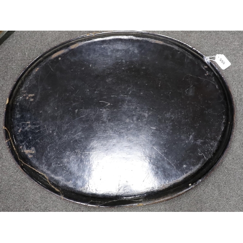 555 - A large Victorian oval papier mache tray hand painted with flowers, 73cm wide