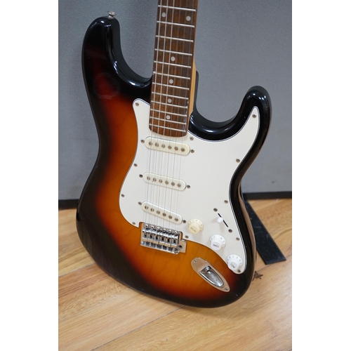 569 - A Collins Sunburst electric guitar with hard flight case