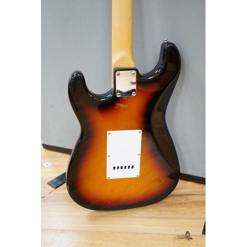 569 - A Collins Sunburst electric guitar with hard flight case