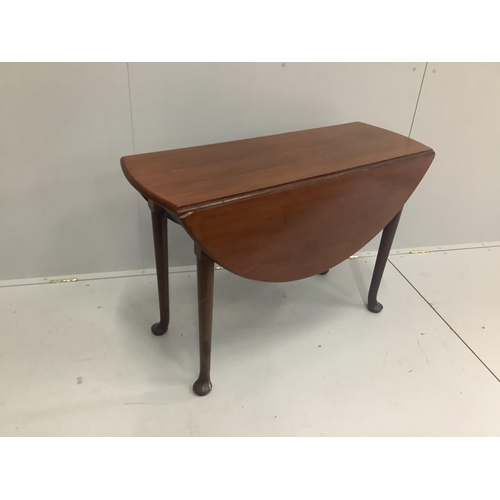 57 - A George III mahogany oval pad foot drop leaf dining table, width 106cm, depth 110cm extended, heigh... 