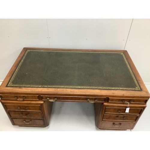 64 - A mid century mahogany pedestal desk, width 162cm, depth 93cm, height 76cm