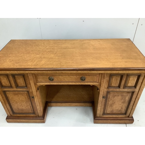 72 - A late Victorian bird's eye maple kneehole desk by Moore and Hunton, London, width 140cm, depth 60cm... 