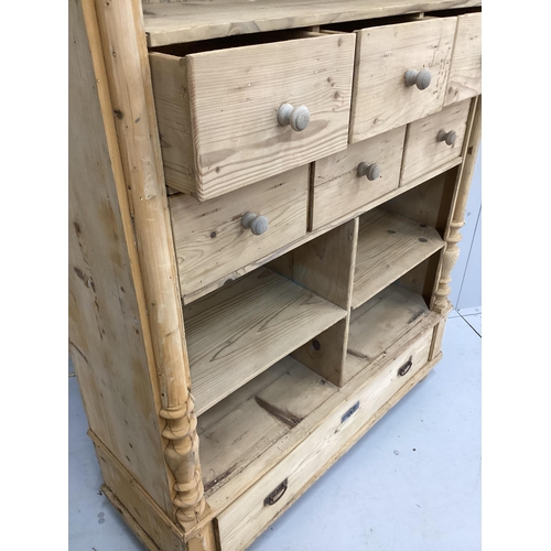 9 - A 19th century East European pine kitchen cabinet, width 120cm, depth 44cm, height 187cm