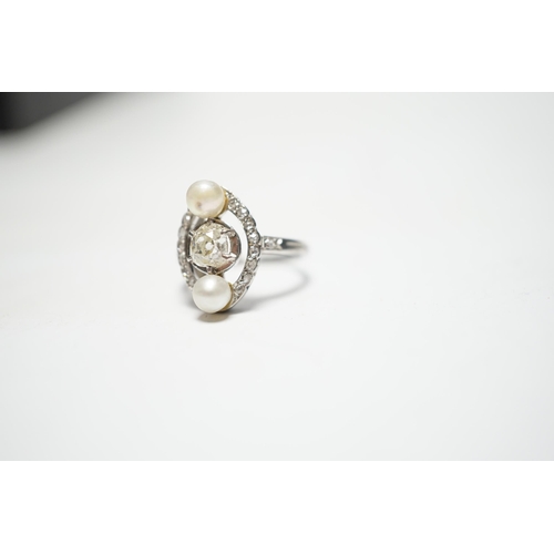 933 - A white metal single stone diamond and two stone cultured pearl set oval ring, with diamond chip set... 