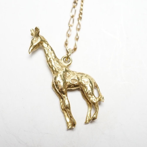 935 - A South African yellow metal giraffe pendant, 30mm, on a 9k chain, gross weight 7.4 grams.