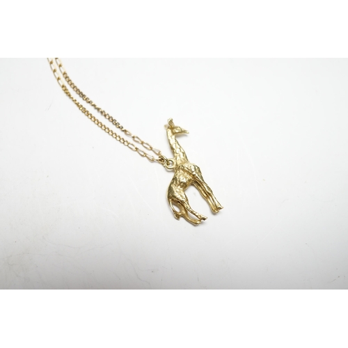 935 - A South African yellow metal giraffe pendant, 30mm, on a 9k chain, gross weight 7.4 grams.