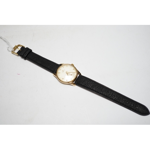 939 - A yellow metal and three stone diamond set bar brooch, 37mm, with safety chain, gross weight 3 grams... 