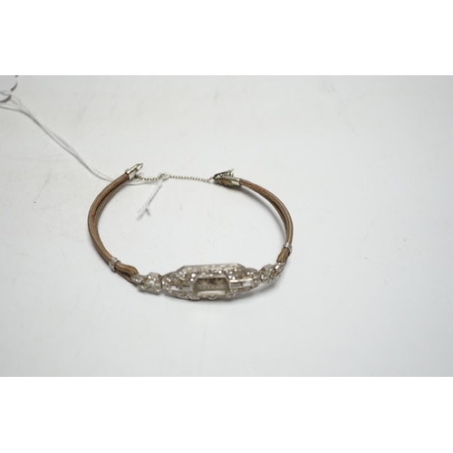 943 - A lady's 1940's/1950's white metal (engraved platinum) and diamond cluster set manual wind cocktail ... 