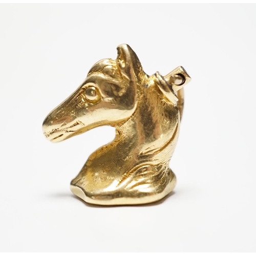 949 - A 19th century yellow metal and bloodstone inset horse's head seal, the matrix carved with crest, 18... 