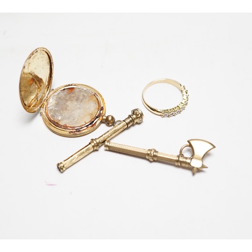 954 - A yellow metal (stamped 18) locket (a.f.), a yellow metal and illusion set diamond chip half eternit... 