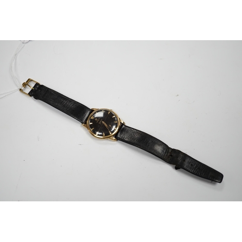 958 - A gentleman's 9ct gold Omega manual wind black dial wrist watch (lacking winding crown), on associat... 