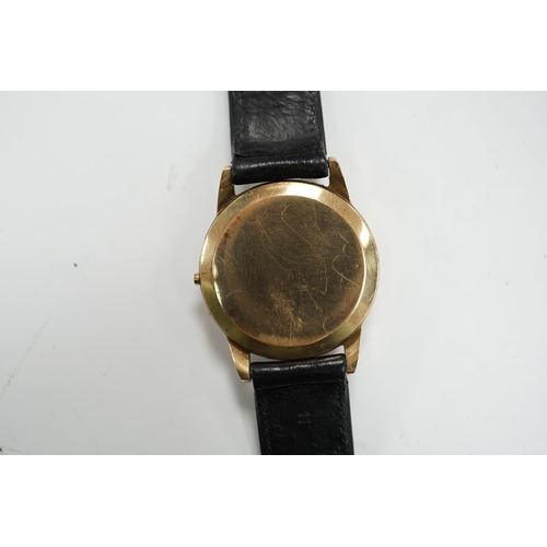958 - A gentleman's 9ct gold Omega manual wind black dial wrist watch (lacking winding crown), on associat... 