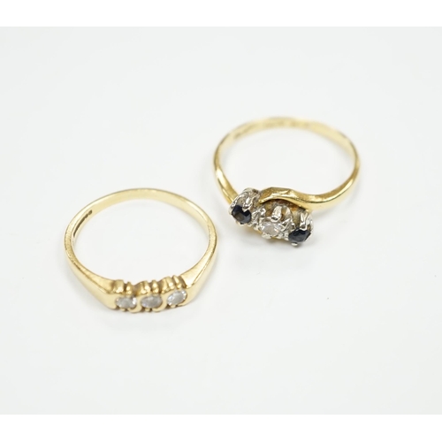 970 - An 18ct gold and three stone diamond ring, size M and an 18ct, sapphire and diamond set three stone ... 